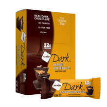 Load image into Gallery viewer, Nugo Dark Peanut Butter Cup Protein Bar packaging on a white background
