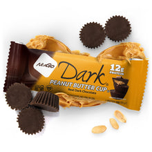 Load image into Gallery viewer, NuGo Dark Peanut Butter Cup packaging with chocolate cups and peanuts on a white background
